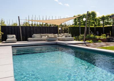 Een schaduwdoek ophangen: zo pak je dat aan